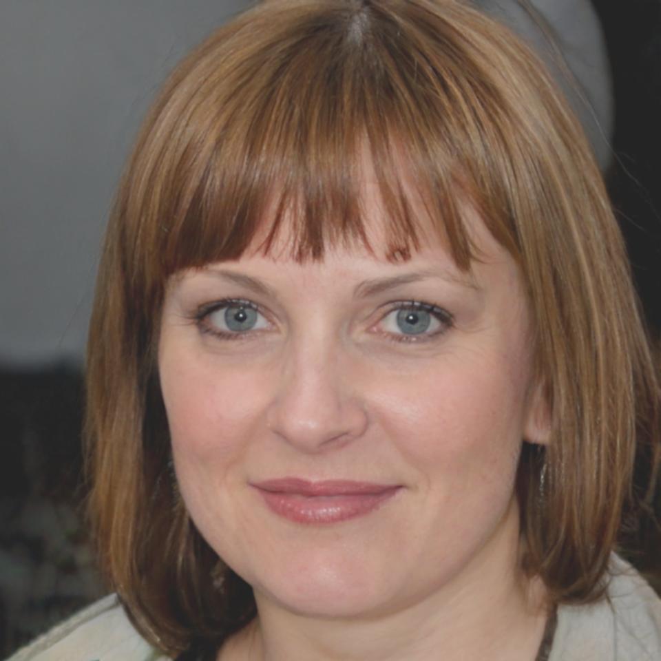 Instructor Seo-Yun Baek reviewing student design work